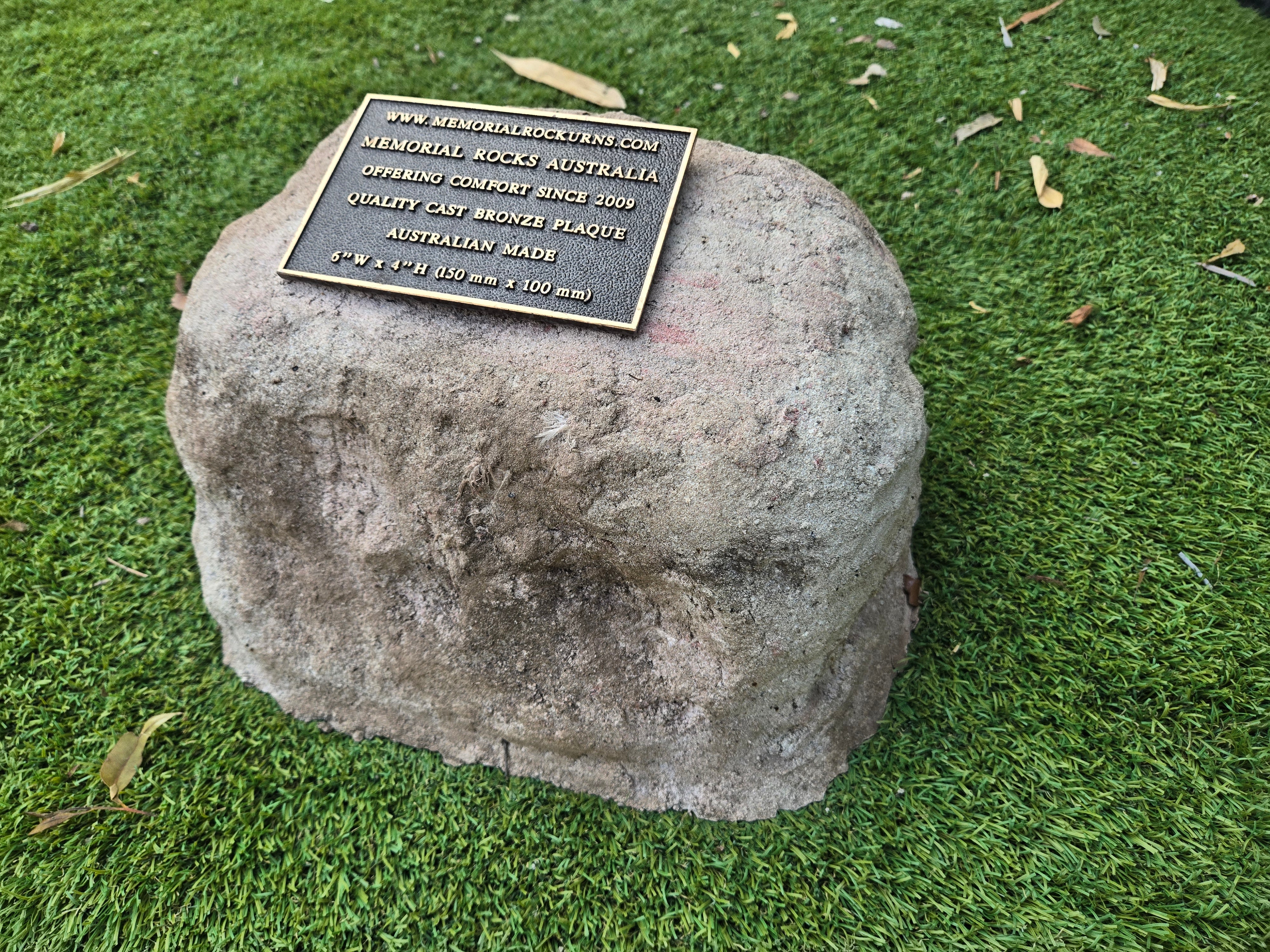 rock urn and plaque